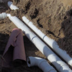 A gravity trench right during backfilling.