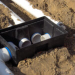 More pipe work in the gravity manifold area.