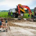 Zack-and-Steve-digging-in-tank-5b4d09b967a78-300x214