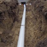 IM0000Gravity Trench :: An upclose view of a gravity trench while we are leveling the pipe.82.JPG