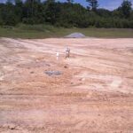Finish grade around a full depth LPP tanks area.