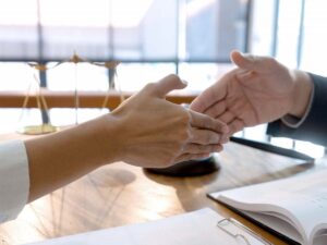 two people shaking hands