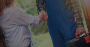 a repairman shaking the hand of a customer