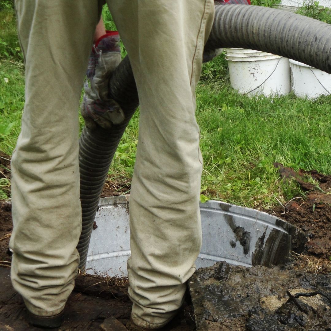 removing septic sludge